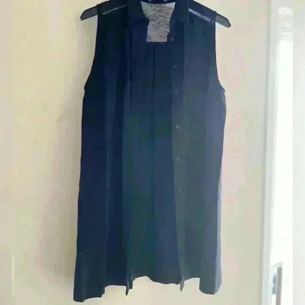 alice & Olivia cut sleeve tunic whit mesh details on the back color black size4